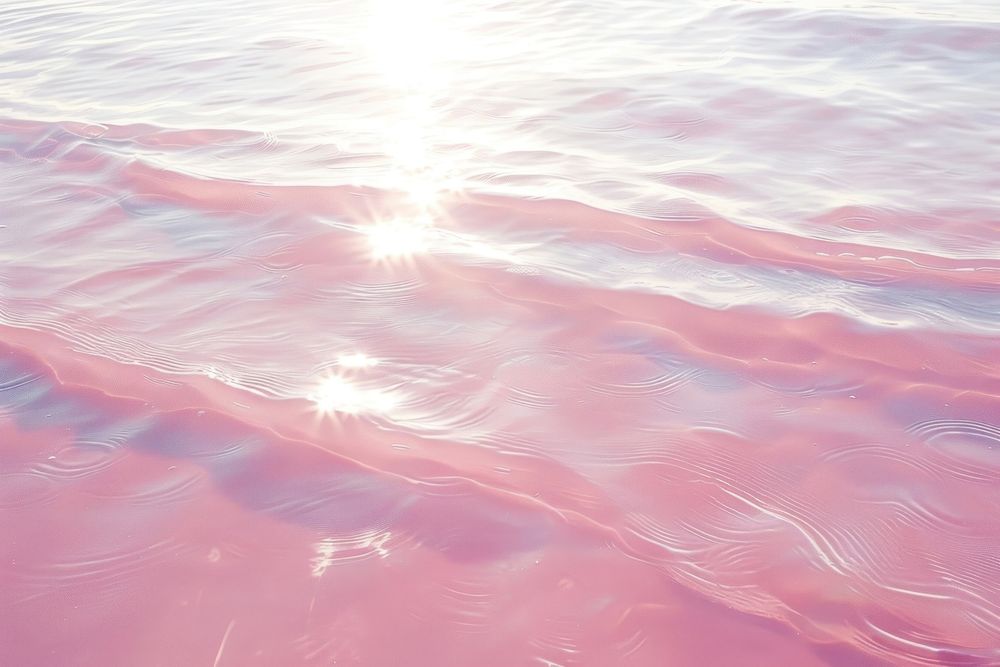 Light pink water shoreline outdoors nature.