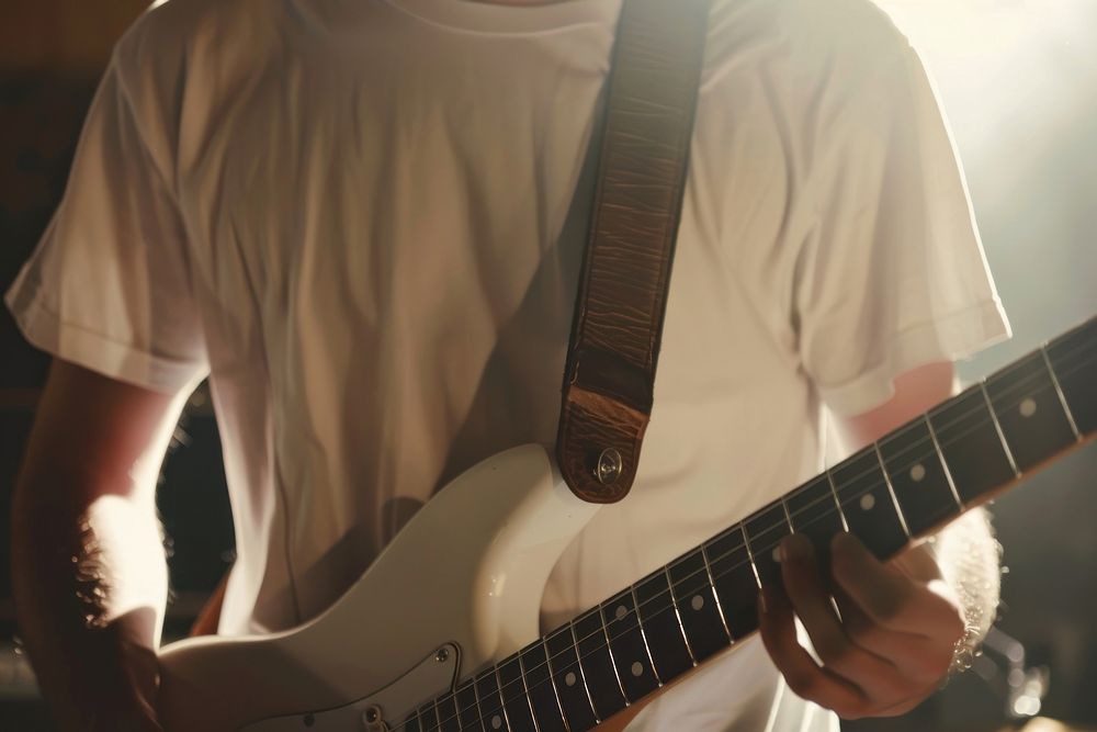 White t shirt mockup guitarist music recreation.