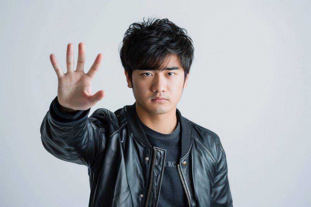 Asian male showing forbid gesture photo photography clothing.