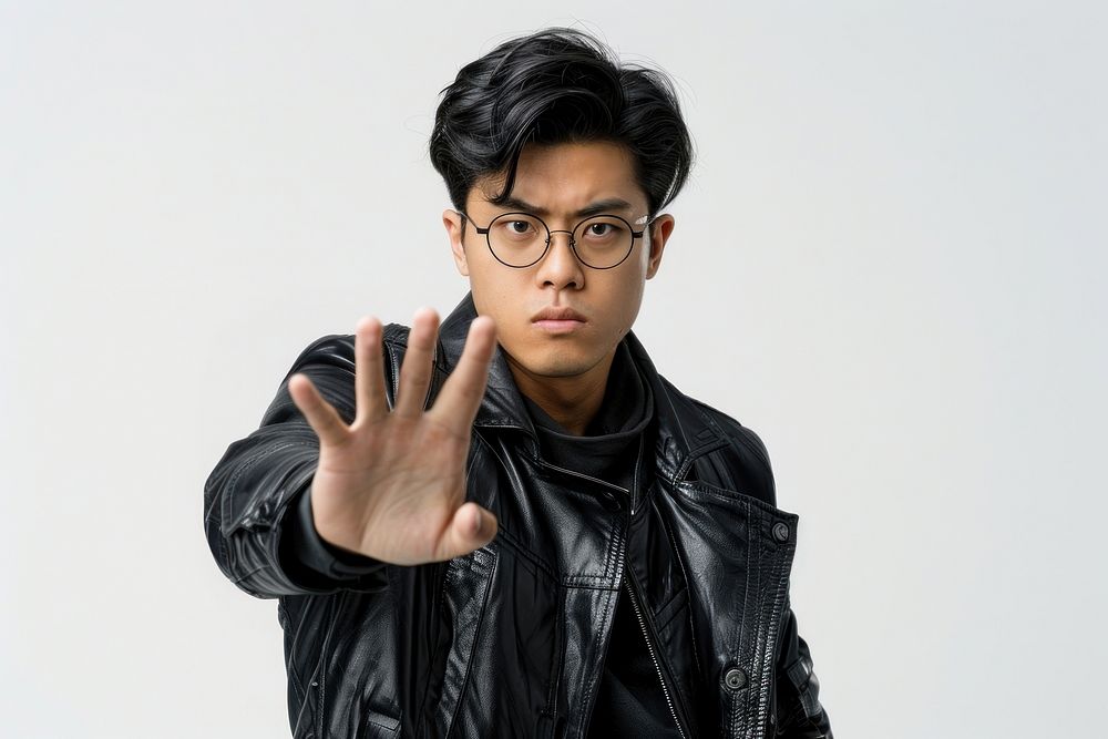 Asian male showing forbid gesture photo photography accessories.