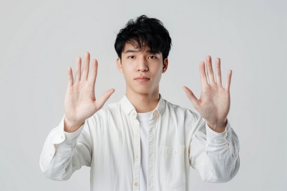 Asian male showing forbid gesture photo photography portrait.