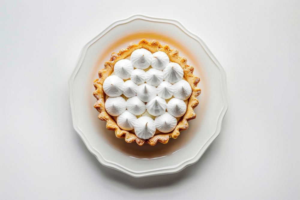 Meringue pie confectionery porcelain dessert.