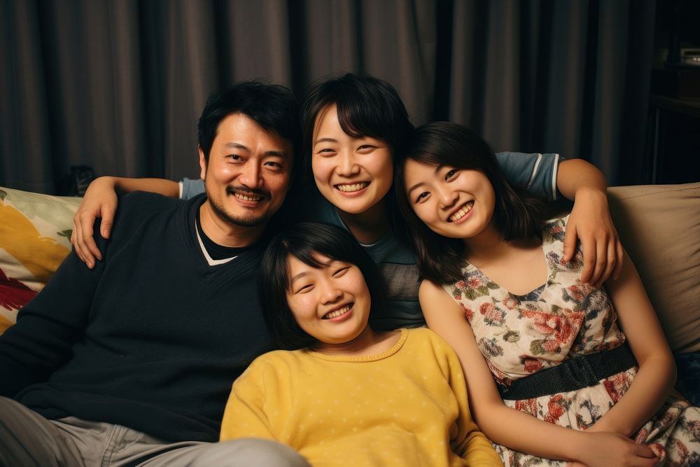 Joyful japanese Family on Couch family couch photo.