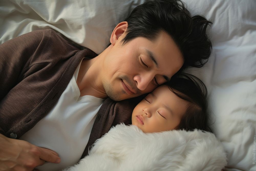 Happy japanese dad and baby photo photography sleeping.