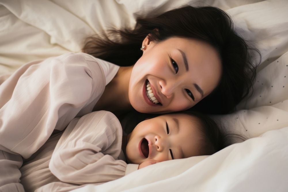 Happy japanese mom and baby person people female.