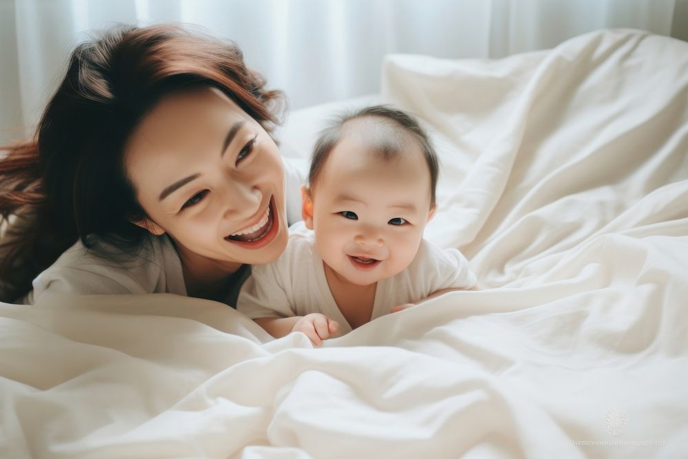 Happy japanese mom and baby blanket people person.