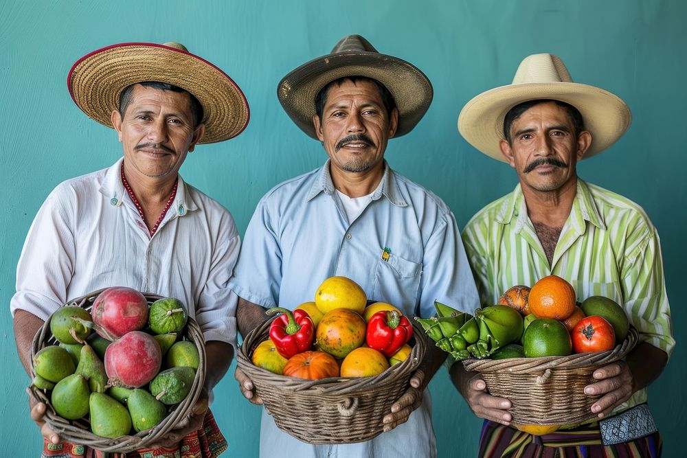 Three hispanic men holding fruits accessories accessory clothing.