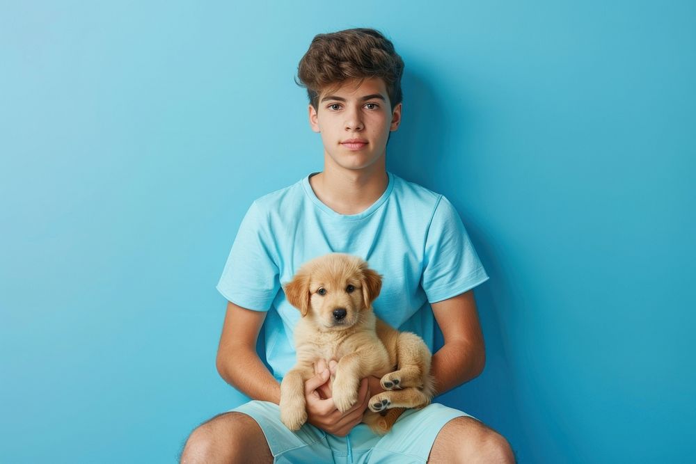 Hispanic man holding dog person animal canine.