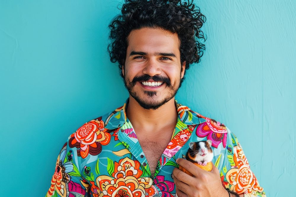 Hispanic man holding hamster dimples person animal.