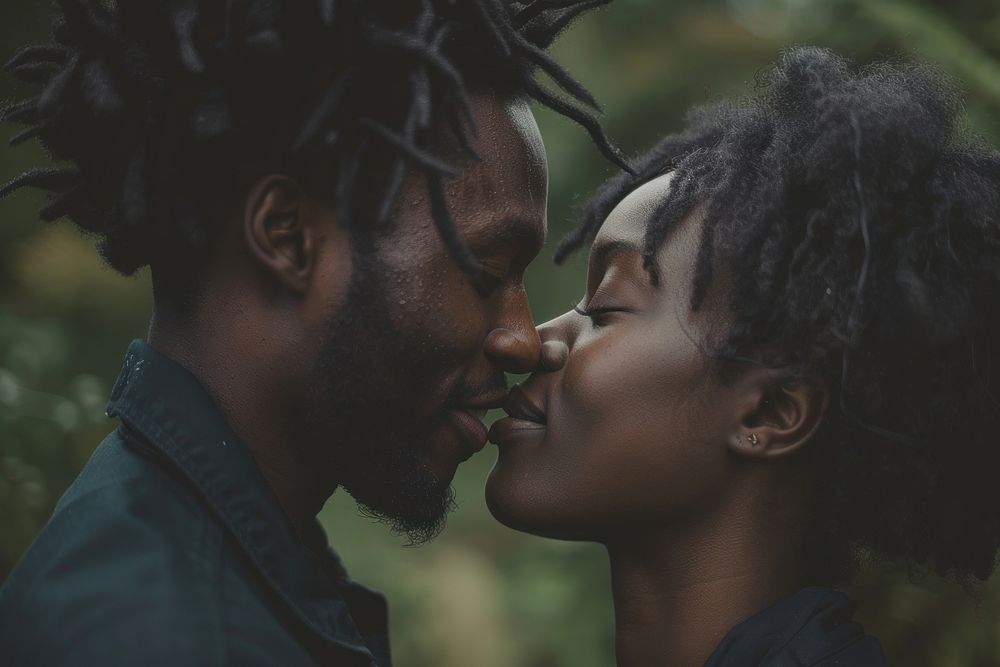 Black couple kiss photography happy bridegroom.