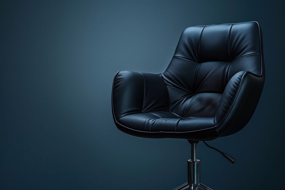 Black office chair furniture armchair indoors.