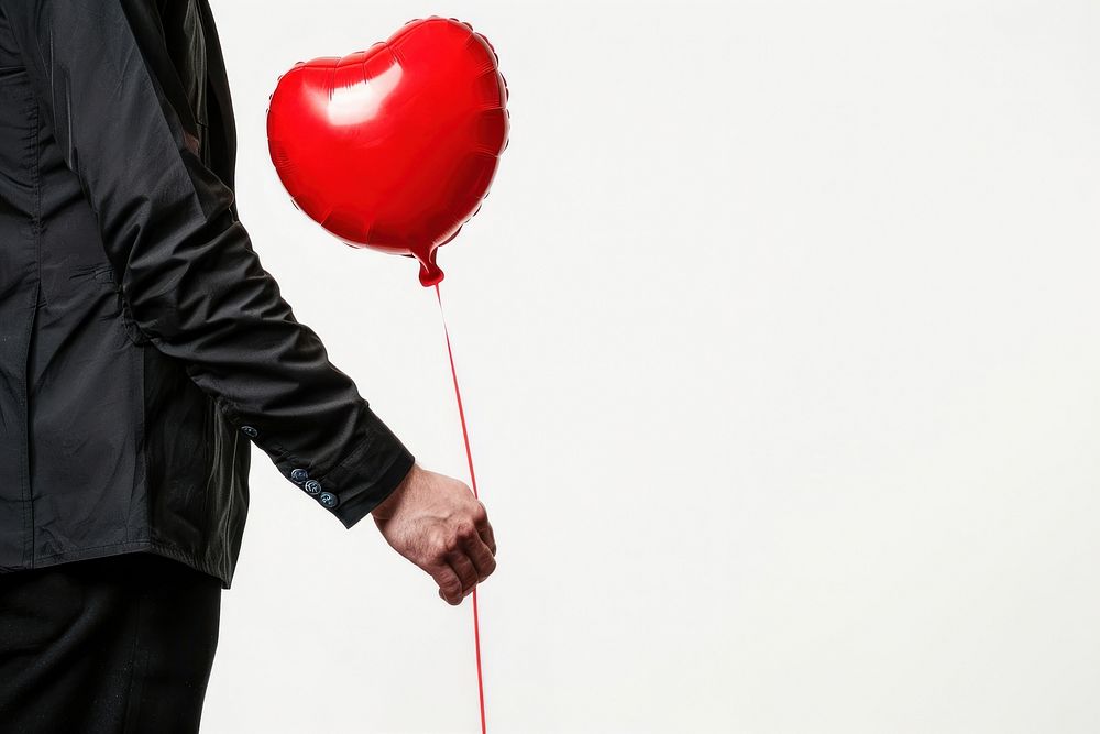 Man holding red balloon in heart shape symbol person adult.