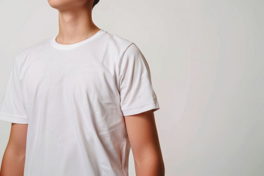 Patient in white t-shirt clothing apparel sleeve.