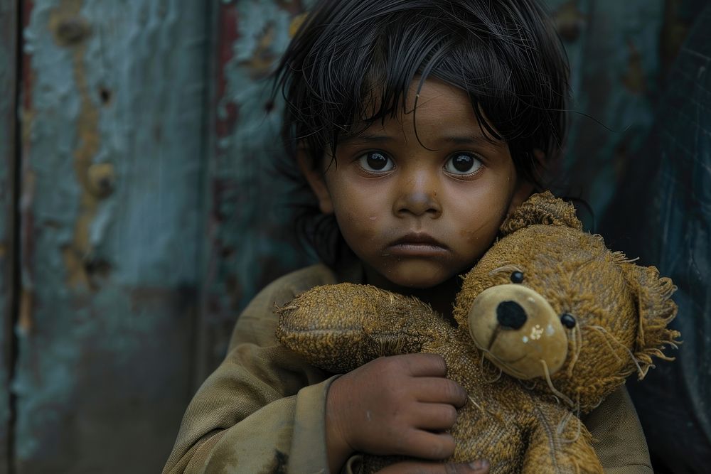 Poverty kid with teddybear photography portrait person.