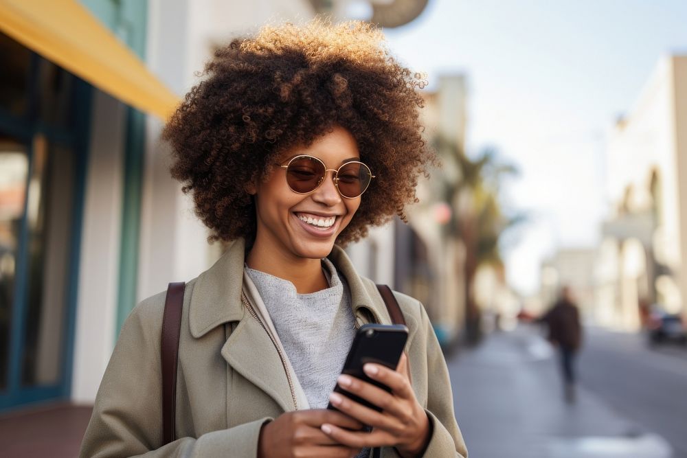 Woman holding cellphone smile adult happy.