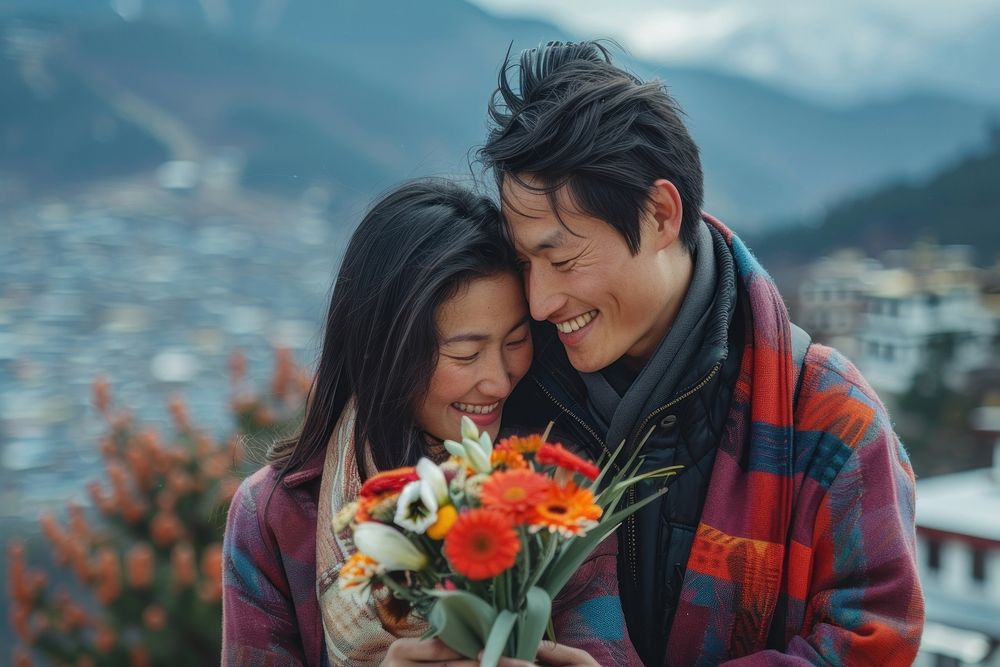 Bhutanese couple giving flower photo photography portrait.