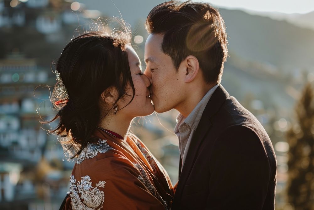 Bhutanese couple kissing together photography romantic face.