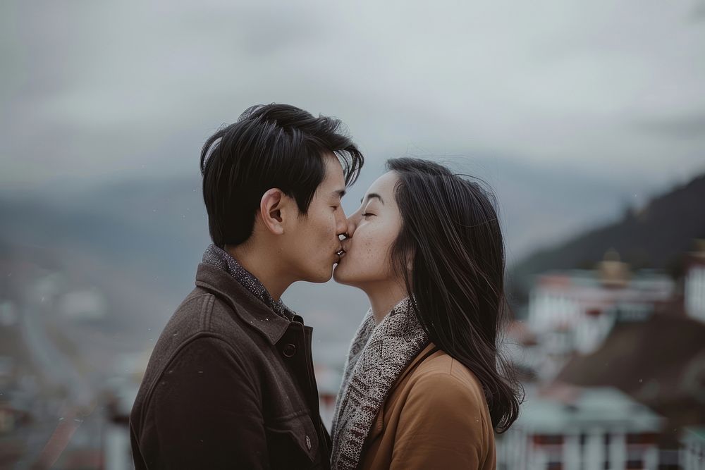 Bhutanese couple kissing together romantic person female.