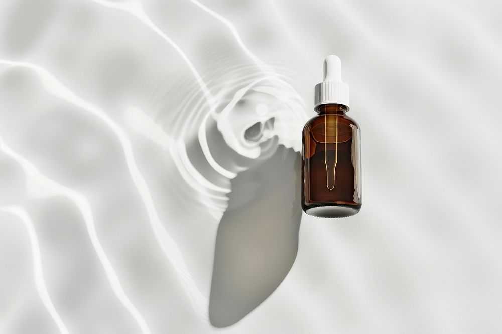 Essential oil mockup cosmetics perfume bottle.