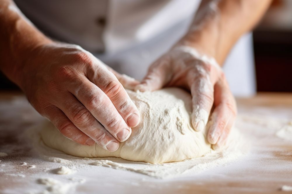 Hands kneading bread dough cooking person human.