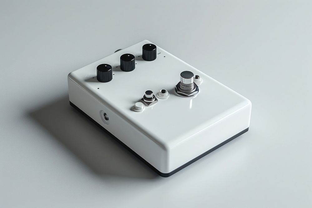 Floating white effect pedal electronics switch electrical device.
