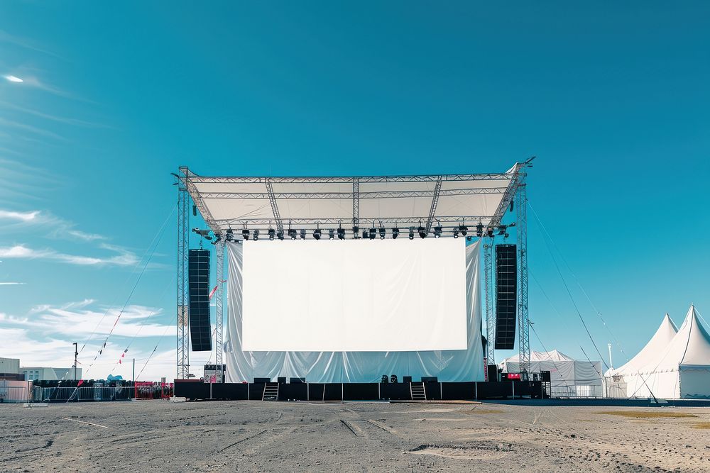 Outdoor concert stage construction with empty white tent and empty billboard outdoors architecture building.