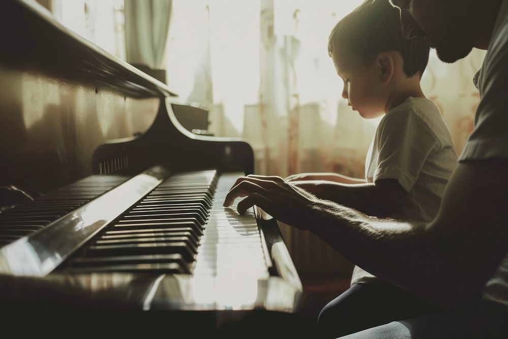 Teacher teaching boy playing piano at music classroom recreation performer musician.