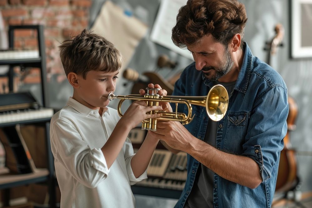 Teacher teaching boy playing trumpet at music classroom flugelhorn recreation performer.