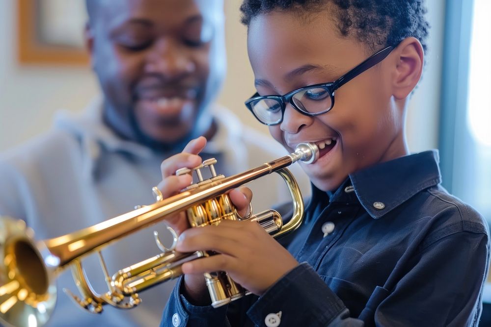 Teacher teaching boy playing trumpet at music classroom flugelhorn recreation performer.