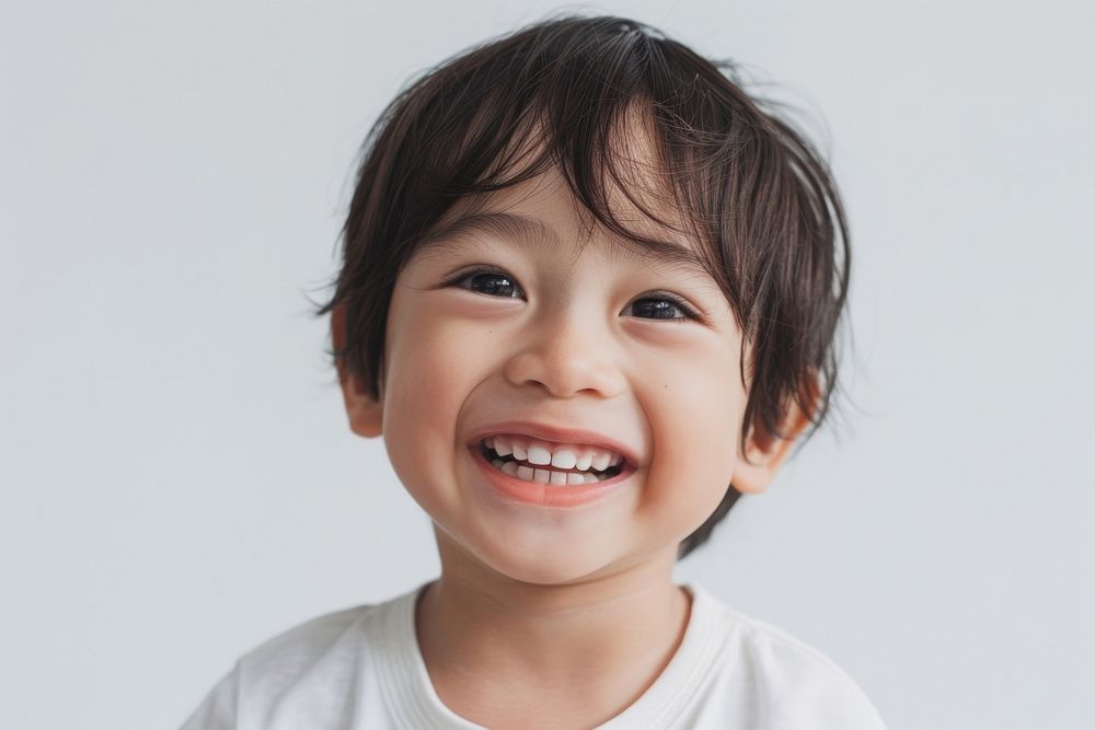 A child lost in baby tooth smiling photo photography portrait.