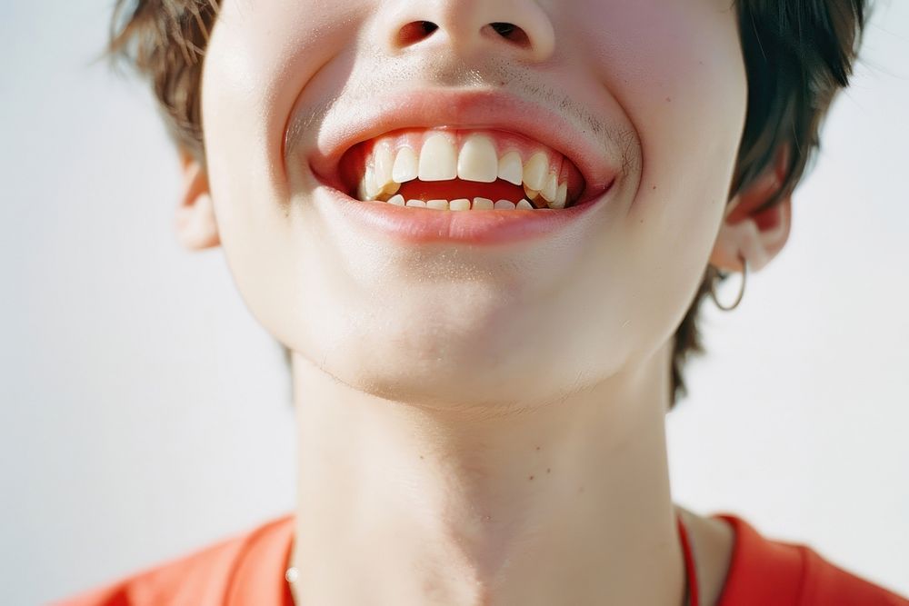 Boy smile and teeth with retainer laughing person human.