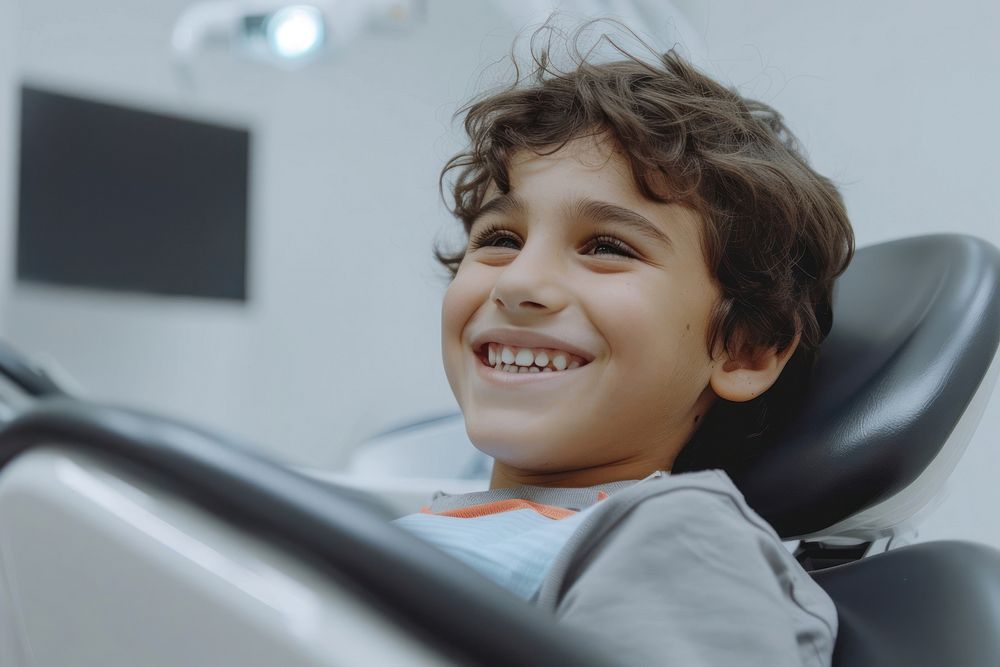 Kid smile sitting on dentist chair person human happy.