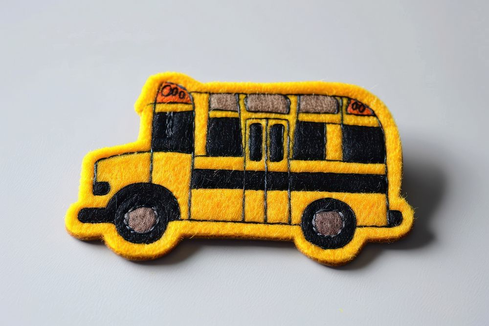 Felt stickers of a single school bus transportation automobile vehicle.