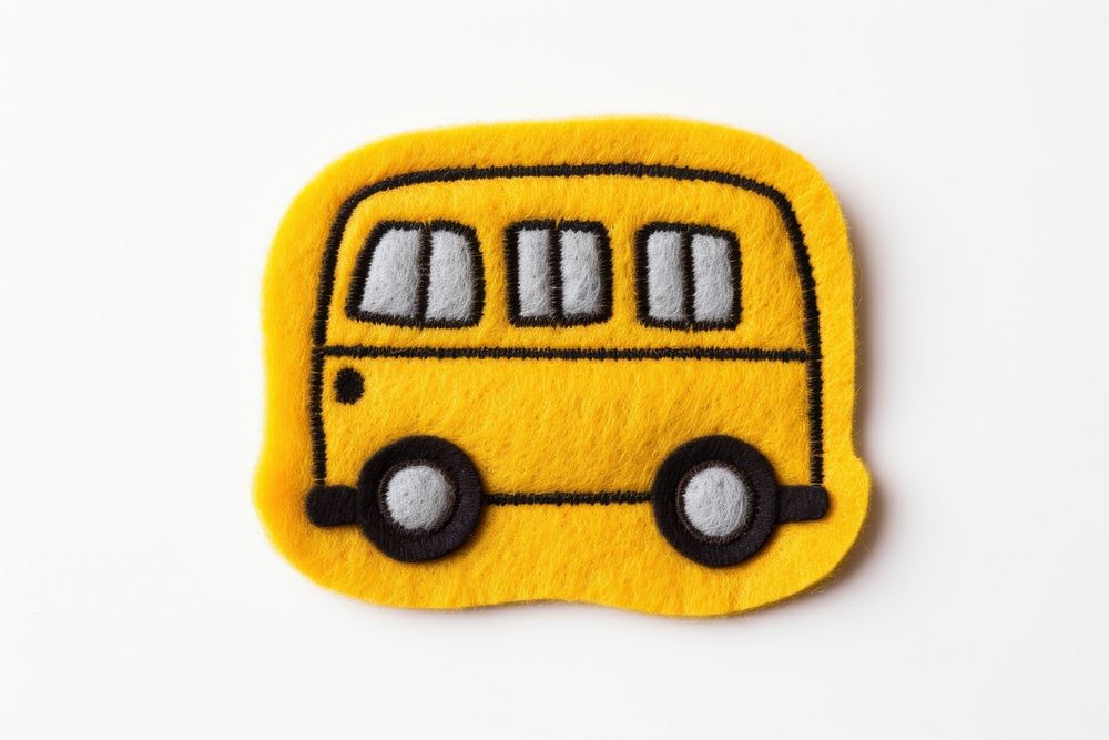 Felt stickers of a single school bus transportation vehicle skating.