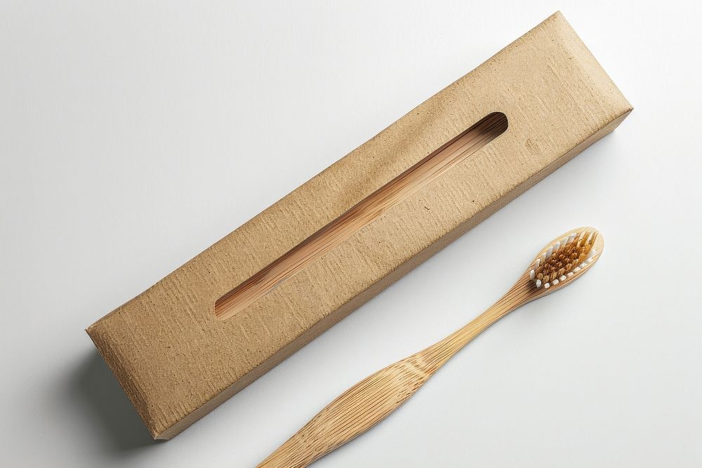Wooden toothbrush with craft plain package box with fabric label mockup cutlery device spoon.