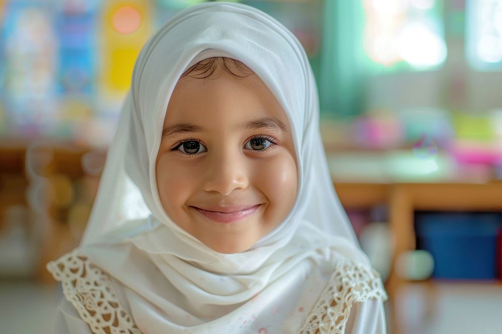 Young muslim girl smiling electronics clothing hardware.