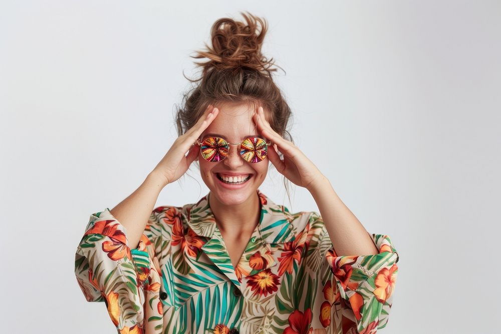 Young female covering eyes with hands smiling cheerful and funny laughing clothing apparel.