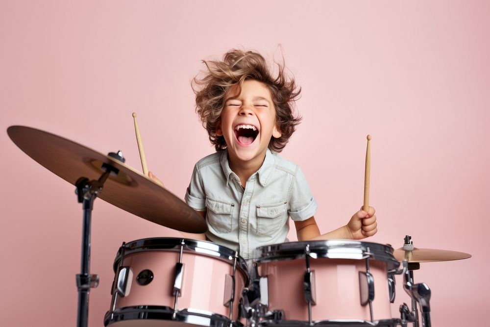 Boy playing drum happy recreation performer.