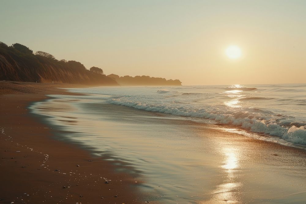 Sunrise beach shoreline outdoors horizon.