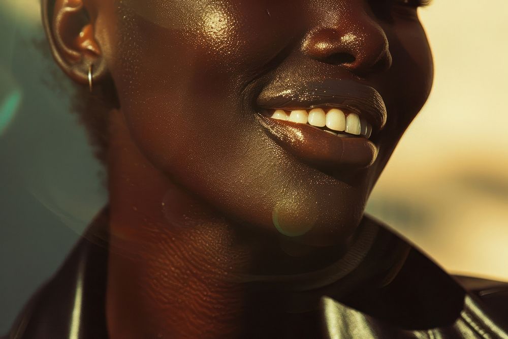 Black androgyne people with big smile person human face.