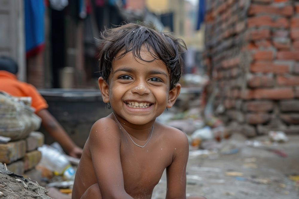 Poor child smiling happily in an atmosphere of poverty accessories accessory necklace.