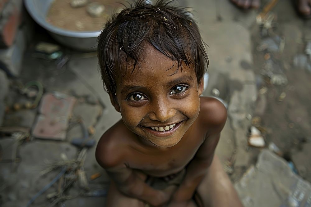 Poor child smiling happily in an atmosphere of poverty photography portrait bathing.