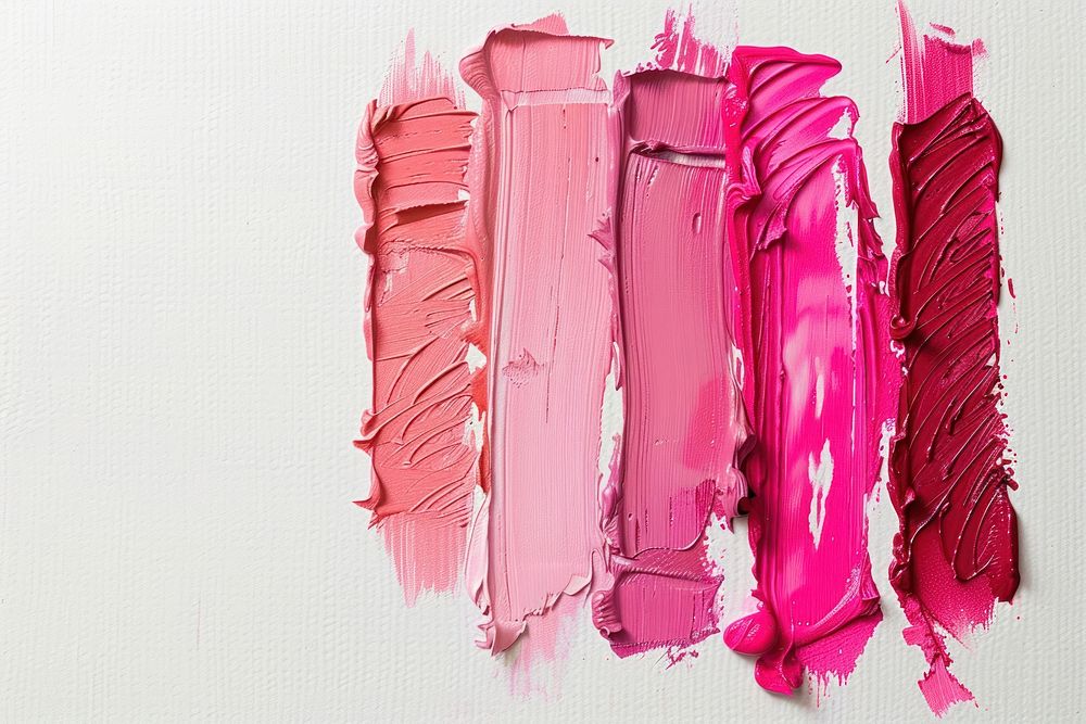 Lipsticks swatch in 3 shades of pink cosmetics clothing apparel.