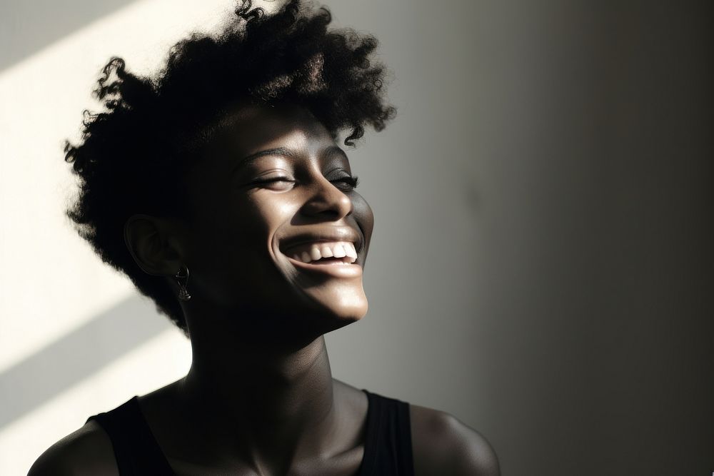 Black androgyne people with big smile photo photography laughing.