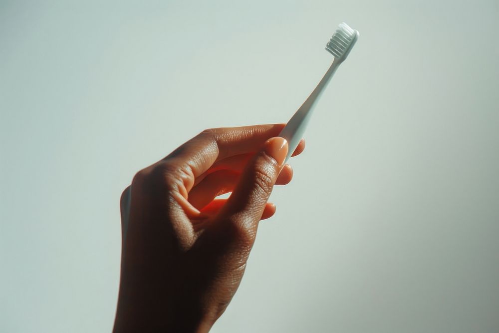Hand with toothbrush white hygiene holding.