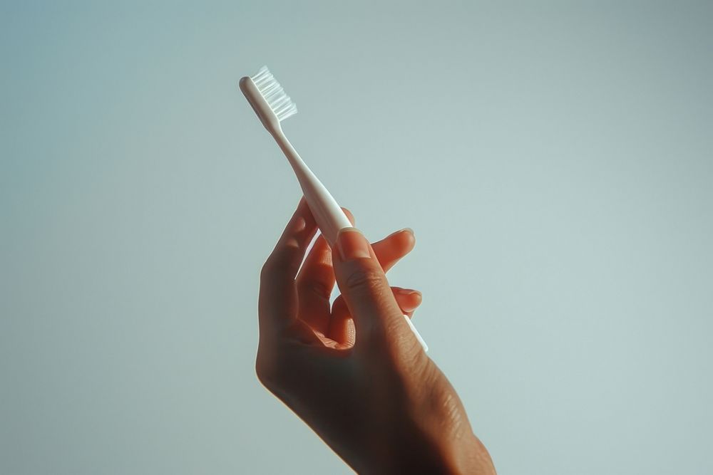 Hand with toothbrush white cigarette narcotic.