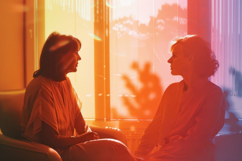 Mental illness patient consult with pychiatrist conversation furniture romantic.