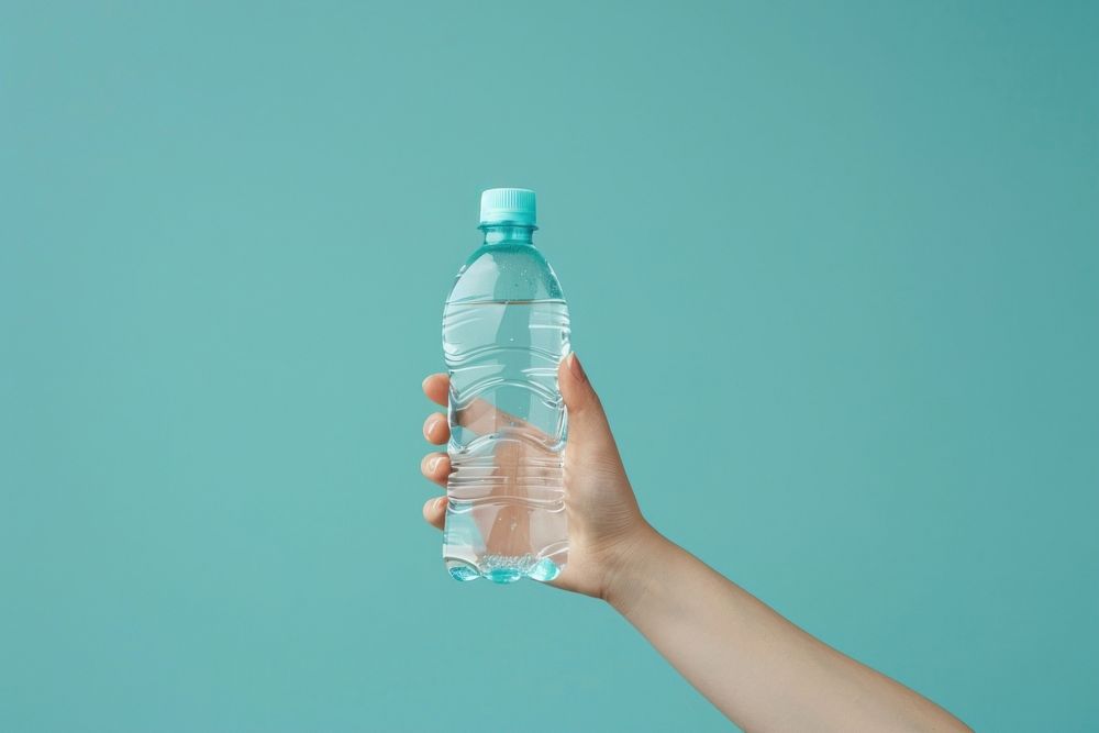 Person holding water bottle beverage plastic drink.