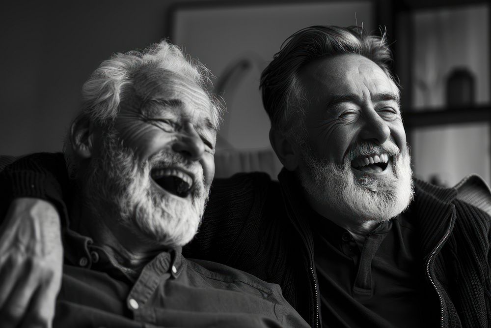 Young and old man laughing happy photo.