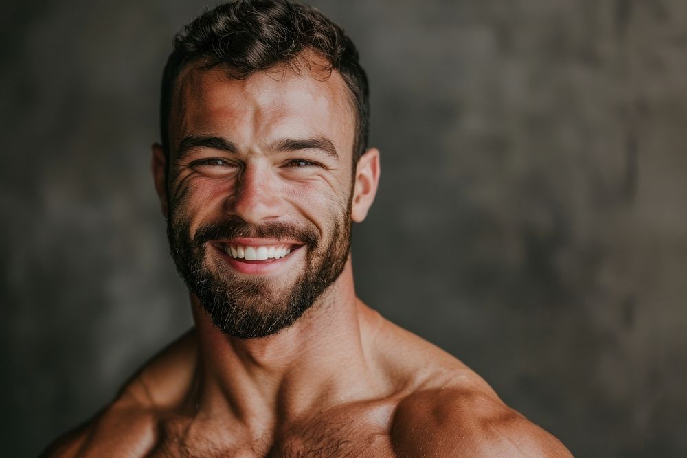 Muscular man laughing dimples person.